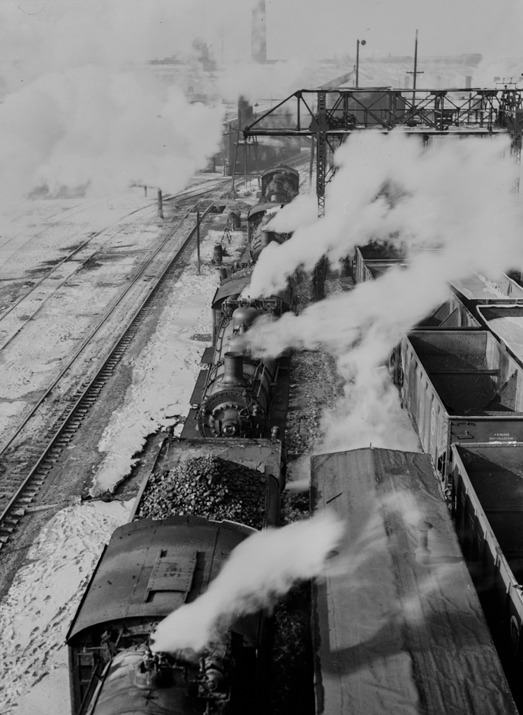 Chicago, Illinois. Locomotives lined up for coal, sand and water at the coaling station in the yard of the Chicago and Northwestern Railroad