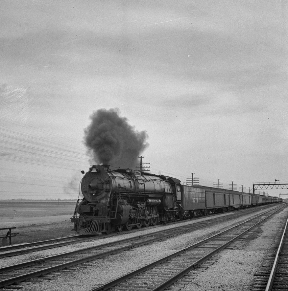 An Atchison, Topeka, and Santa Fe passenger train passing through the Flint Hills district of Kansas
