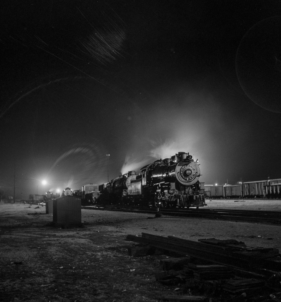 Barstow, California. A view of the Atchison, Topeka and Santa Fe Railroad yard at night