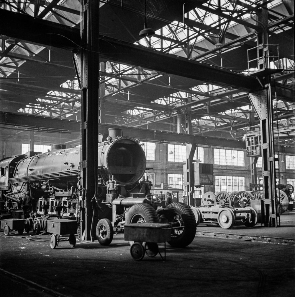 Chicago, Illinois. Locomotives in for repair at the roundhouse at an Illinois railroad yard