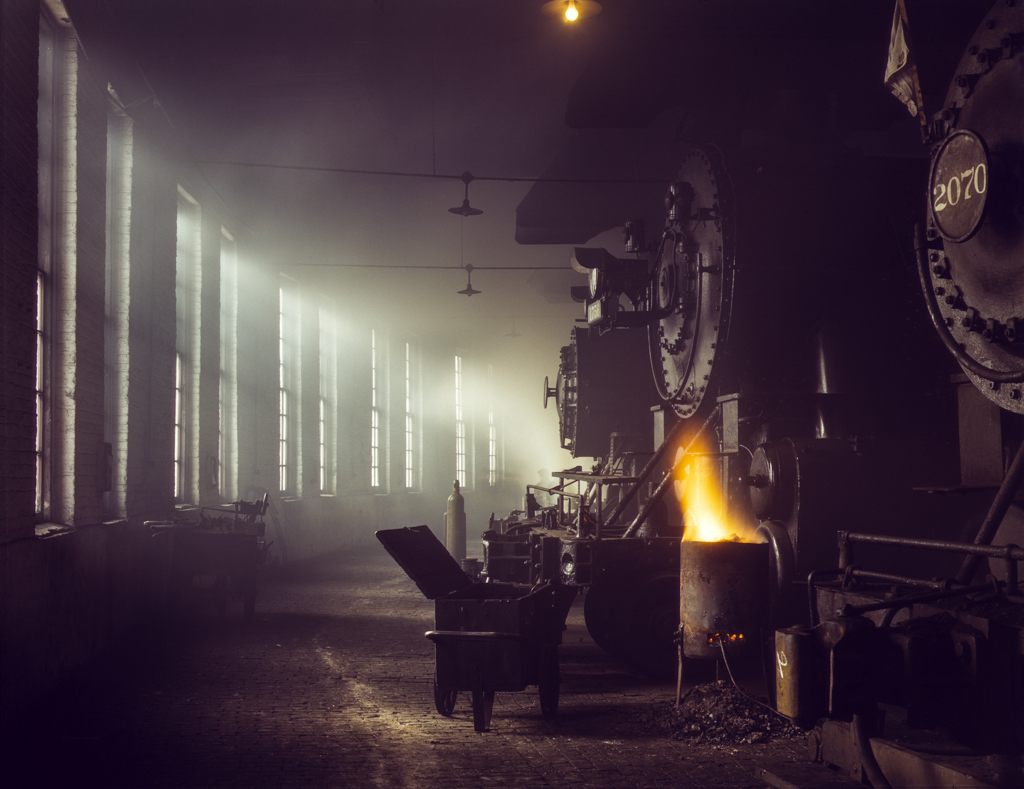 In the roundhouse at a Chicago and Northwestern Railroad yard, Chicago, Ill.-Edit