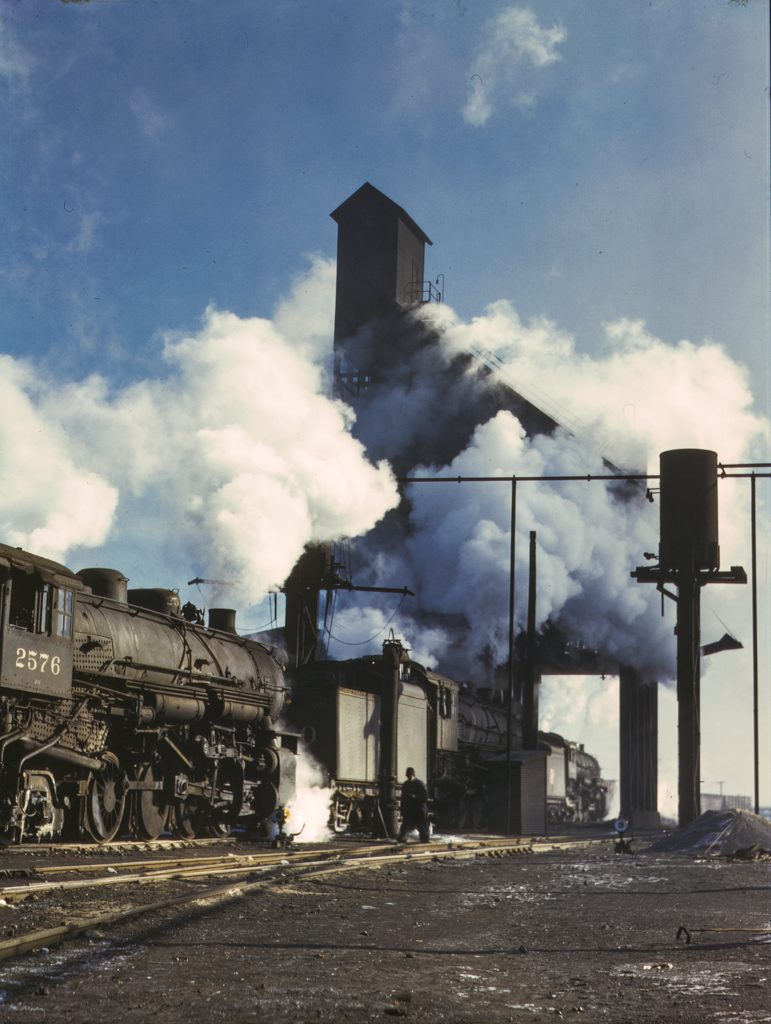 Locomotives over the ash pit at the roundhouse and coaling station at the Chicago and Northwestern Railroad yards, Chicago, Ill