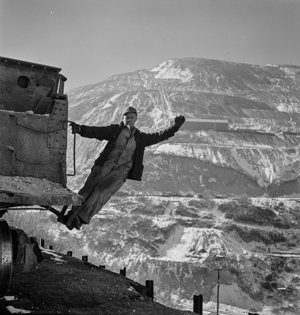 Utah Copper -Bingham Mine. Brakeman of an ore train at the open-pit mining operations of Utah Copper Company, at Bingham Canyon, Utah