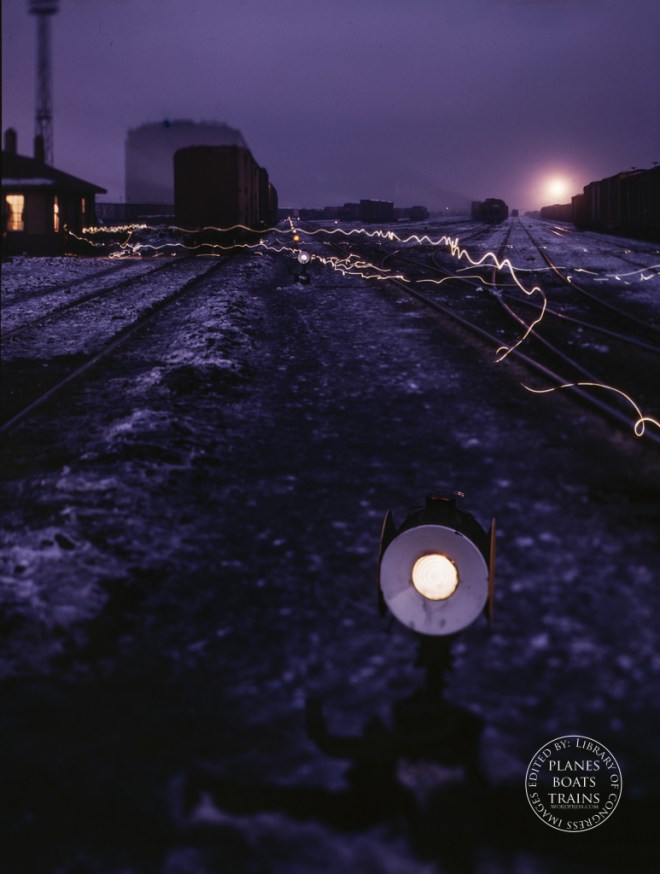 View in a departure yard at C & NW RR's Proviso yard at twilight, Chicago, Ill.